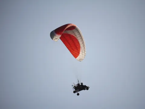 Sunset Paramotor Flying Over Vang Vieng